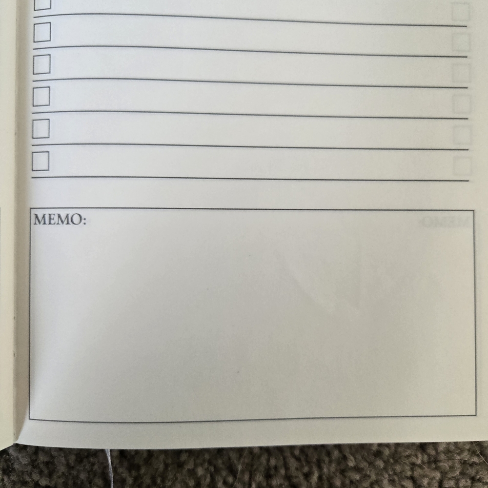 New in package-Stylish black/gold daily planner. - Picture 2 of 5